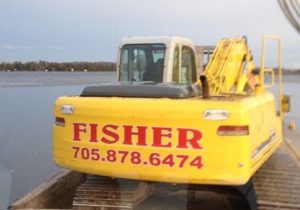 fisher excavator on dock