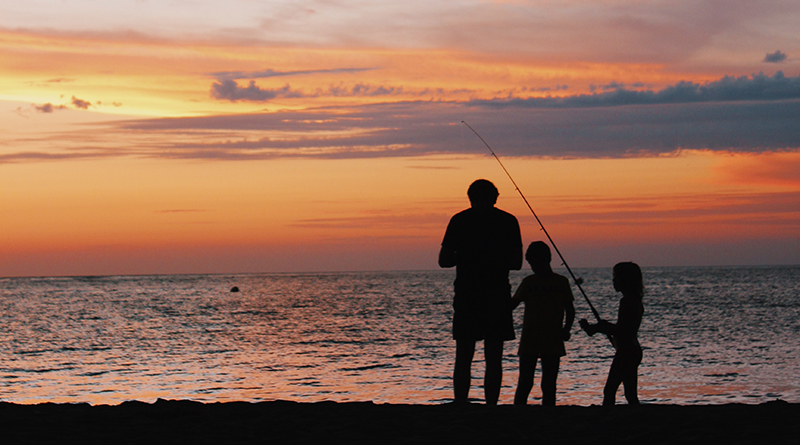 kids fishing with parent